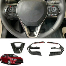 Load image into Gallery viewer, Carbon Fiber Style Steering Wheel Trim 2019+ Toyota Corolla Hatchback